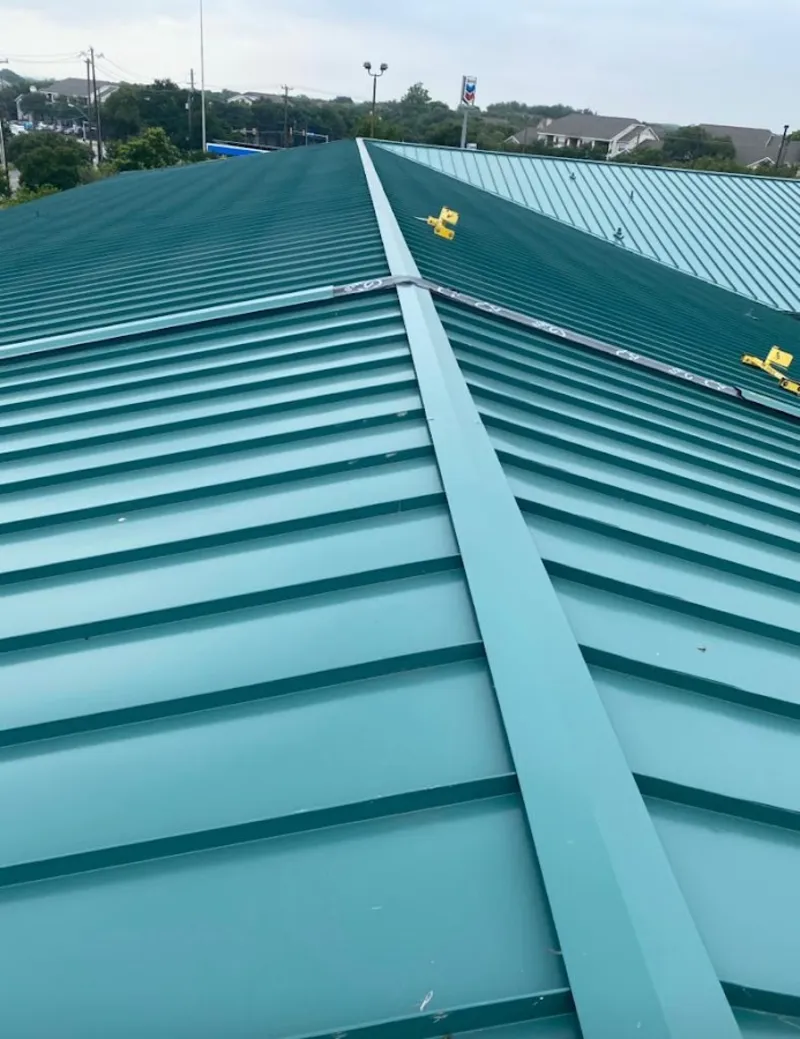 Green commercial metal roof ridge and valley for Metal Roof Repair in Bonne Terre